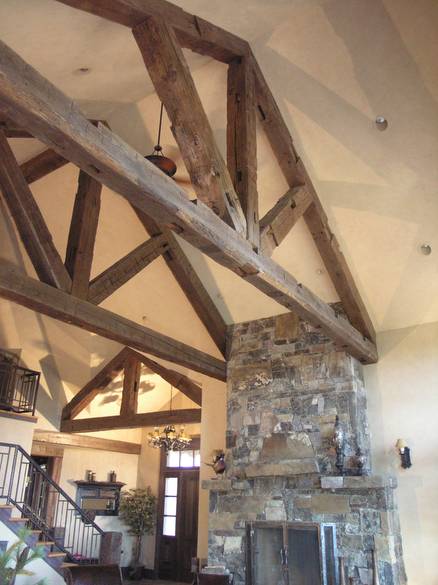 Hand-Hewn Timbers and Trusses / These hand-hewn timbers were stained by the contractor before installation